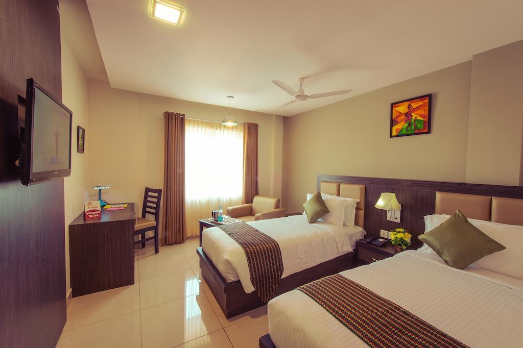 Plaza Hotel Trichy Tiruchirappalli Oda fotoğraf